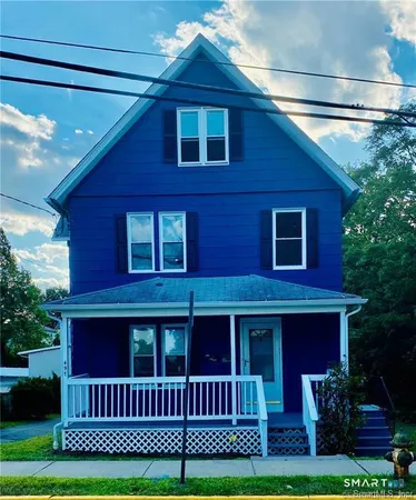 a view front of a house with a yard