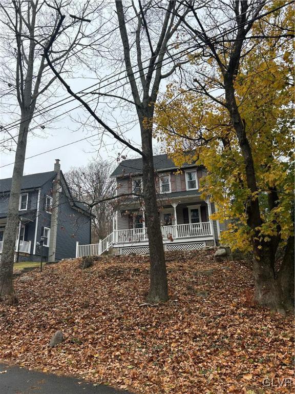18 Repsher Road Bangor, PA 18013 - Photo 4 of 23 a tree in front of a house with a trees
