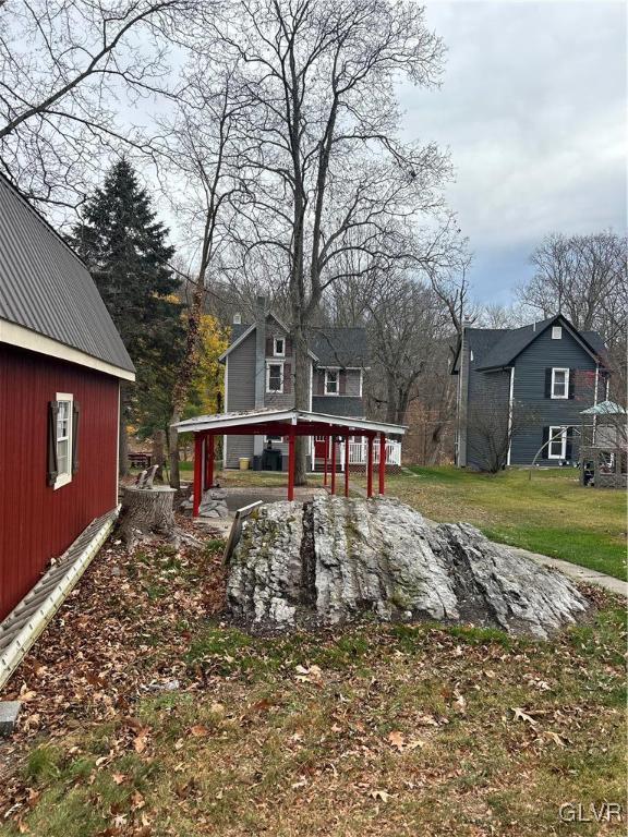 18 Repsher Road Bangor, PA 18013 - Photo 6 of 23 a front view of a house with garden