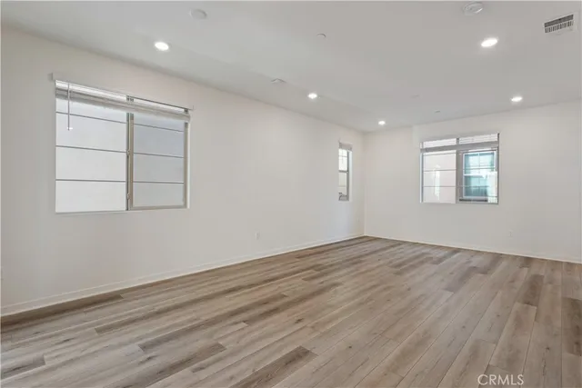 a view of a kitchen from the hallway