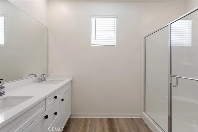 a bathroom with a sink toilet and vanity