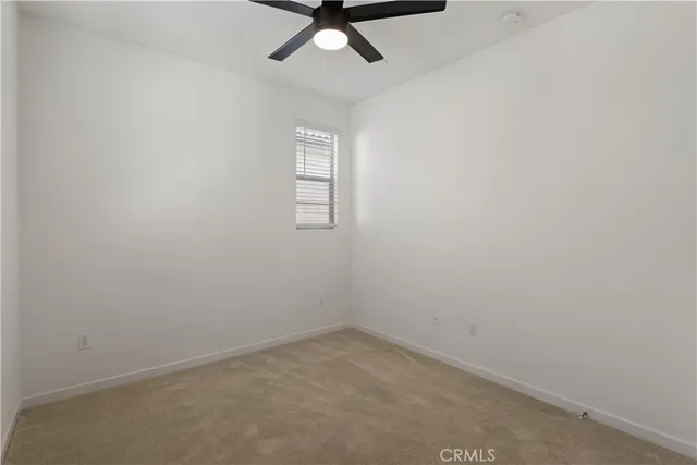 a terrace of a house with outdoor seating