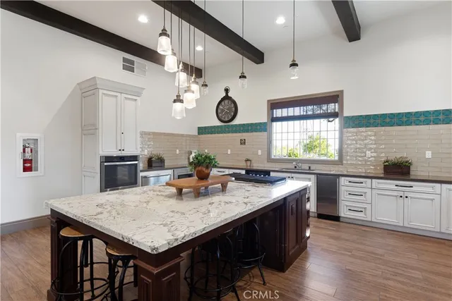 a view of a swimming pool and lounge chairs