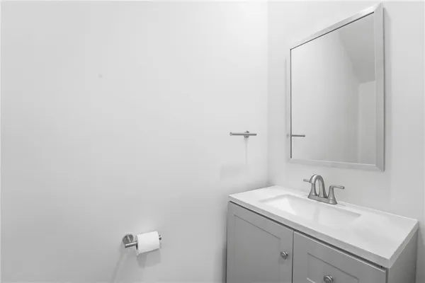 a bathroom with a sink and a vanity