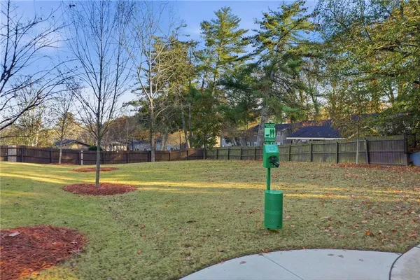 a view of a playground with basketball court