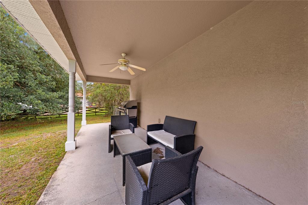 1965 Mustang Court St. Cloud, FL 34771 - Photo 26 of 33 a outdoor space with patio