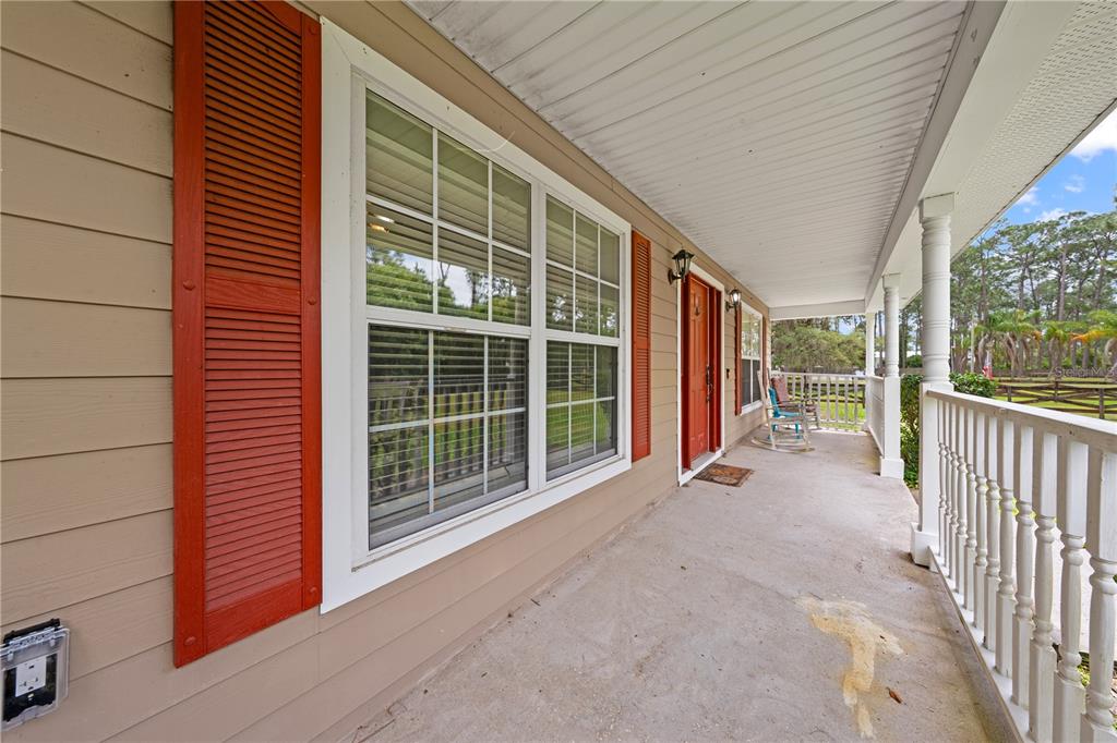 1965 Mustang Court St. Cloud, FL 34771 - Photo 3 of 33 a view of a house with porch