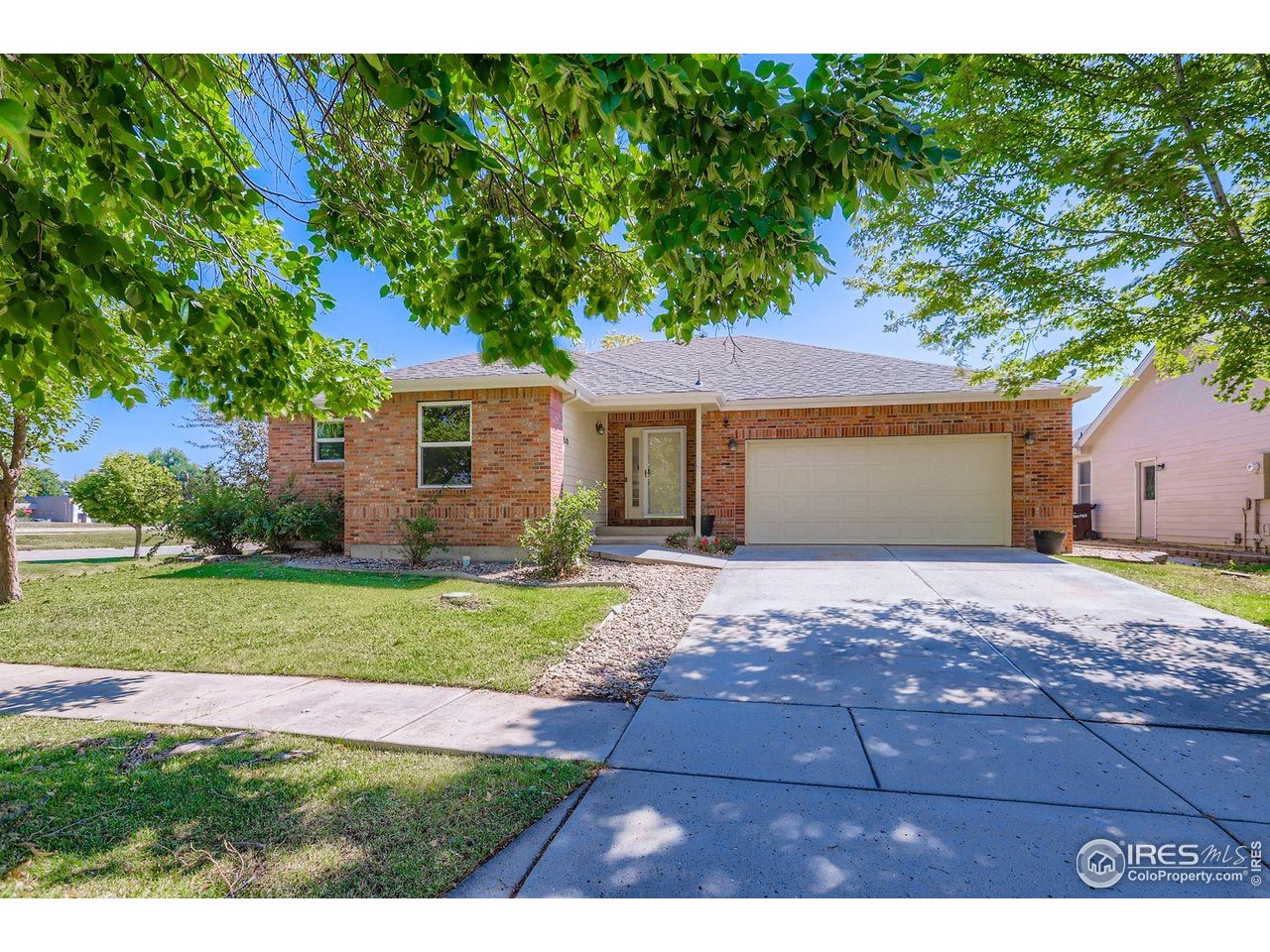 310 Bein Street Berthoud, CO 80513 - Photo 3 of 31 a view of backyard of house with yard and outdoor seating