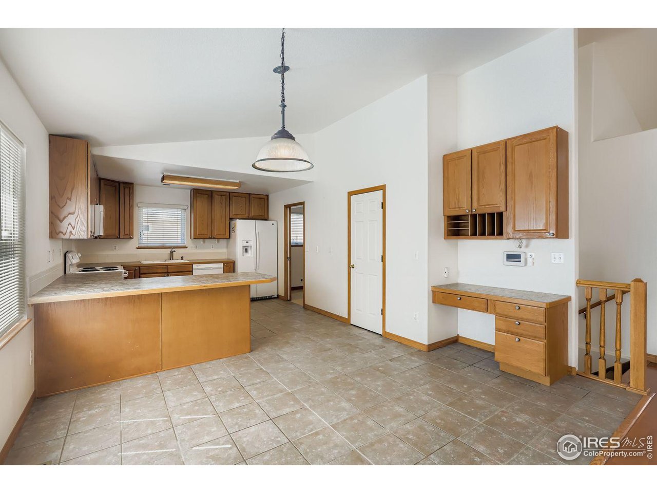 310 Bein Street Berthoud, CO 80513 - Photo 7 of 31 a open kitchen with stainless steel appliances granite countertop a sink and dishwasher