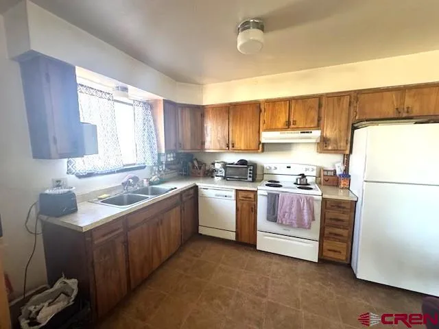 a room with water heater and a window