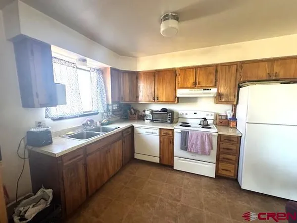 a room with water heater and a window