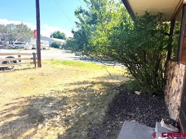 a view of an ocean from a yard