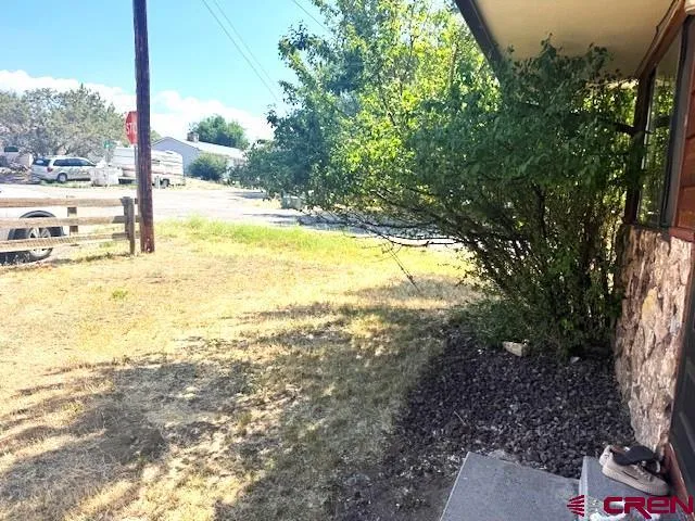 a view of an ocean from a yard