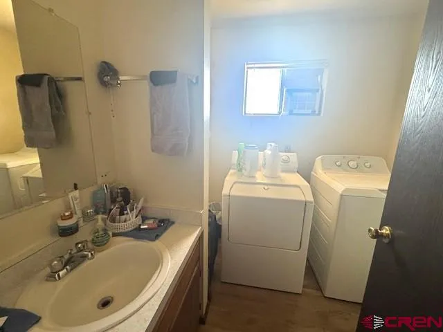 a bathroom with a toilet and a sink