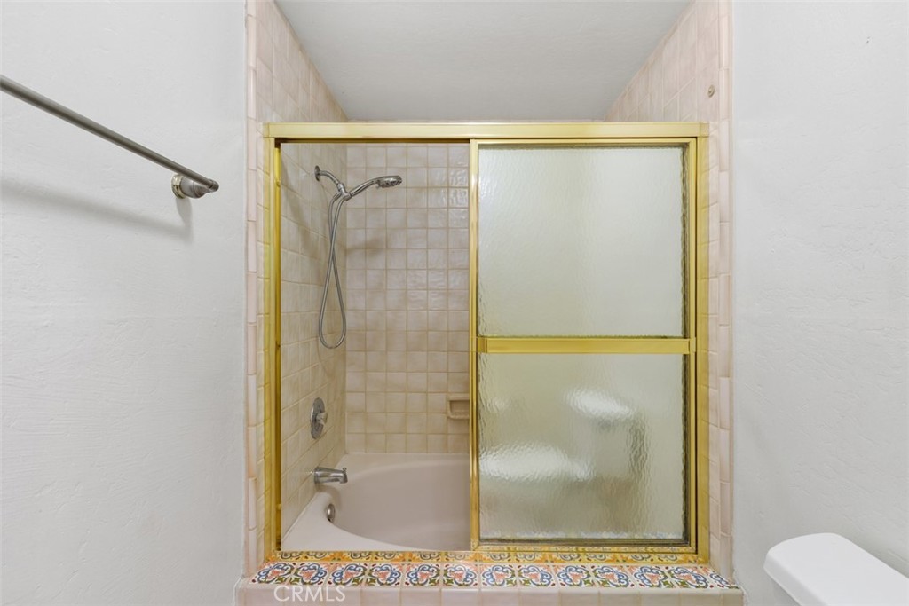 38285 Oaktree Loop Murrieta, CA 92562 - Photo 26 of 39 a bathroom with a shower