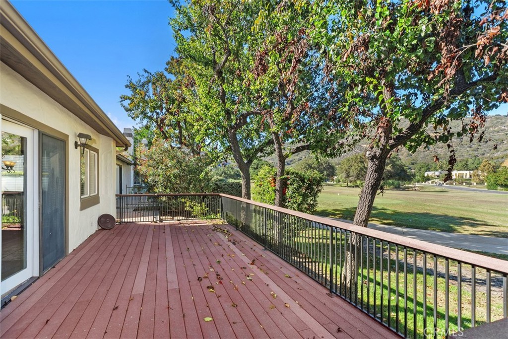 38285 Oaktree Loop Murrieta, CA 92562 - Photo 35 of 39 a view of a balcony with wooden floor