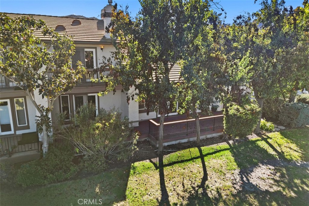 38285 Oaktree Loop Murrieta, CA 92562 - Photo 36 of 39 a view of a house with a yard