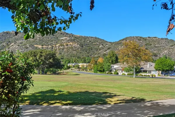 a view of an ocean from a big yard