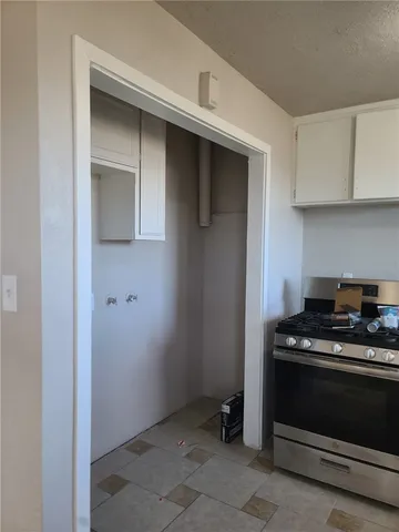 a view of kitchen and utility room