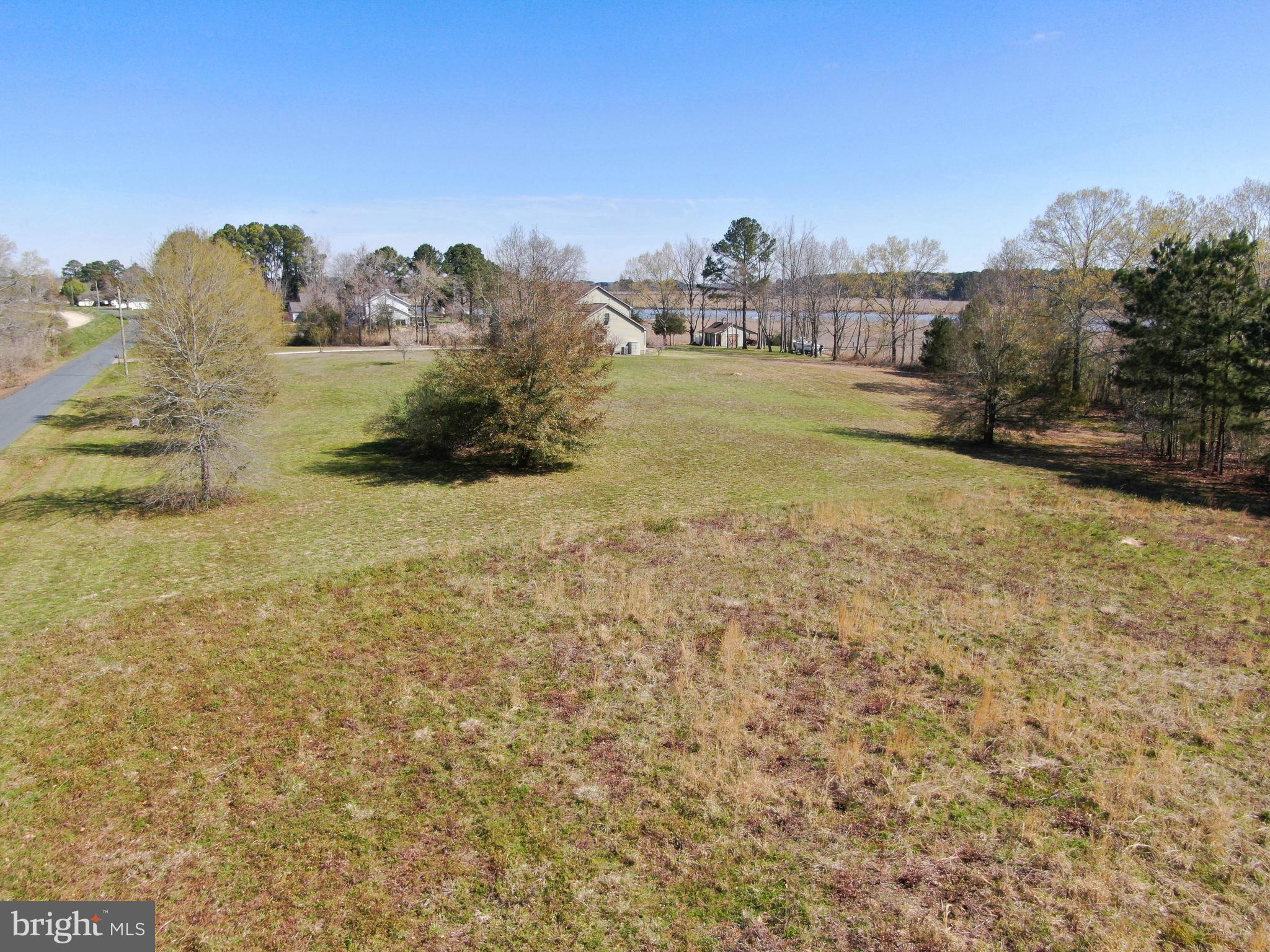 0 Green Hill Church Road Quantico, MD 21856 - Photo 11 of 17 a view of a lake with a building in the background