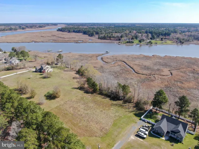 an aerial view of a houses with outdoor space