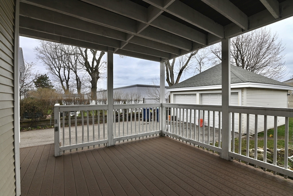 44-42 Farquhar Road, Unit 1 Newton, MA 02460 - Photo 10 of 11 a view of a porch with wooden floor