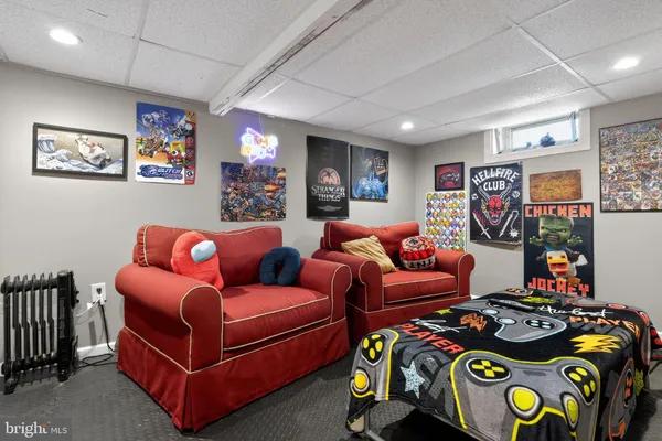 a bedroom with furniture and a couch