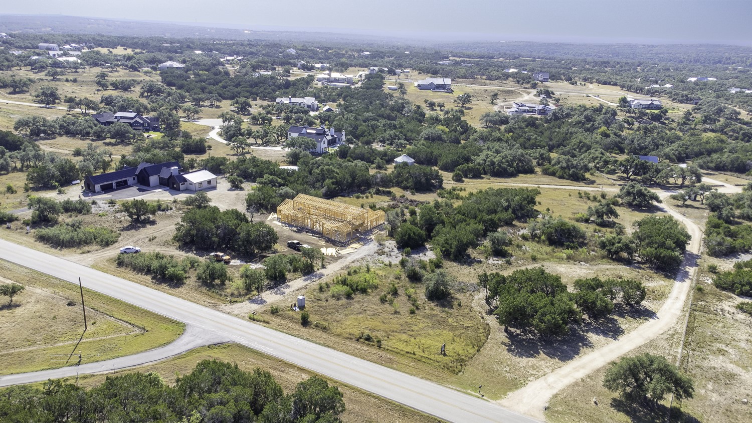 2251 West Fitzhugh Road Dripping Springs, TX 78620 - Photo 7 of 16 a view of a city from a terrace
