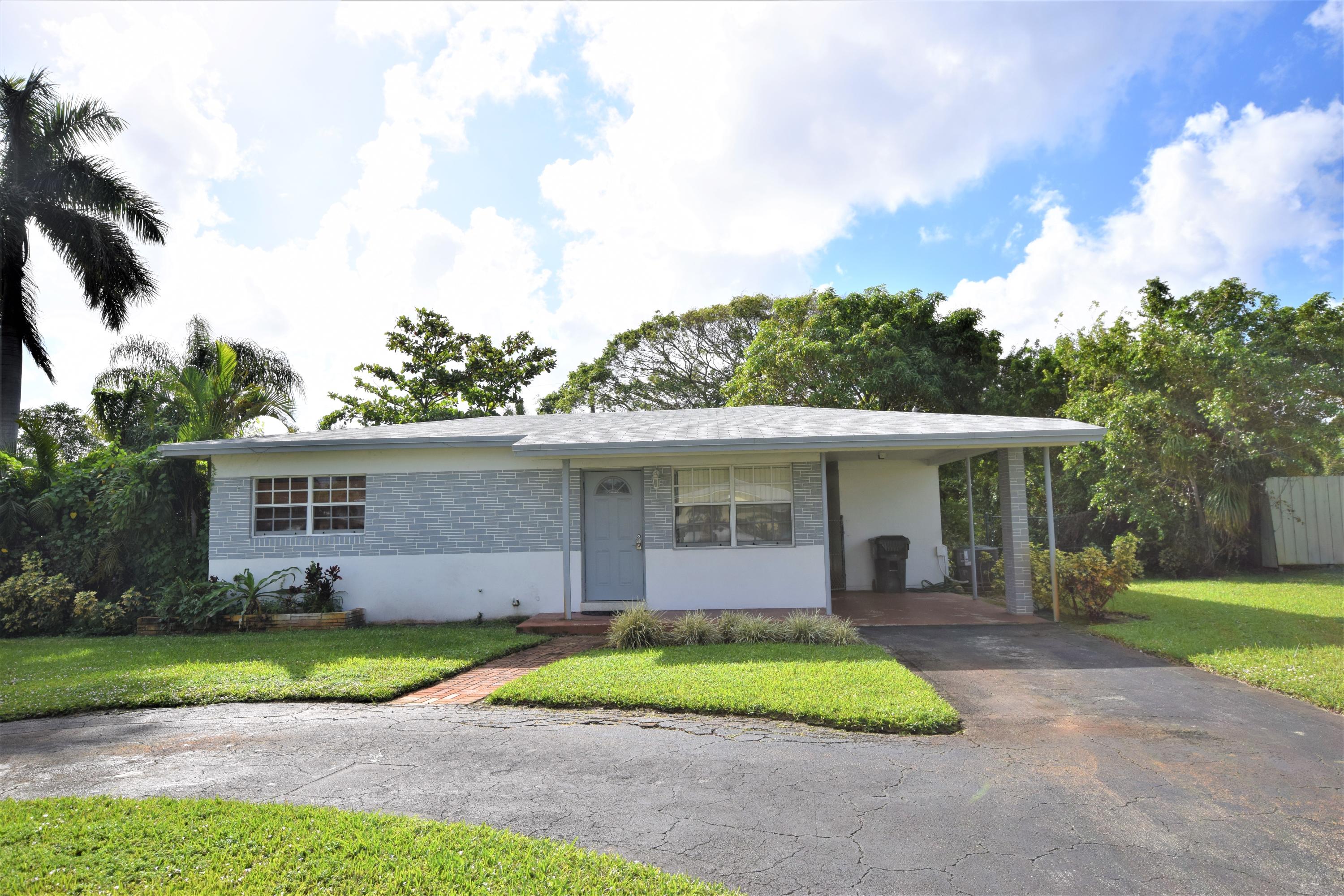 264 Northwest 45th Street Boca Raton, FL 33431 - Photo 1 of 18 Front