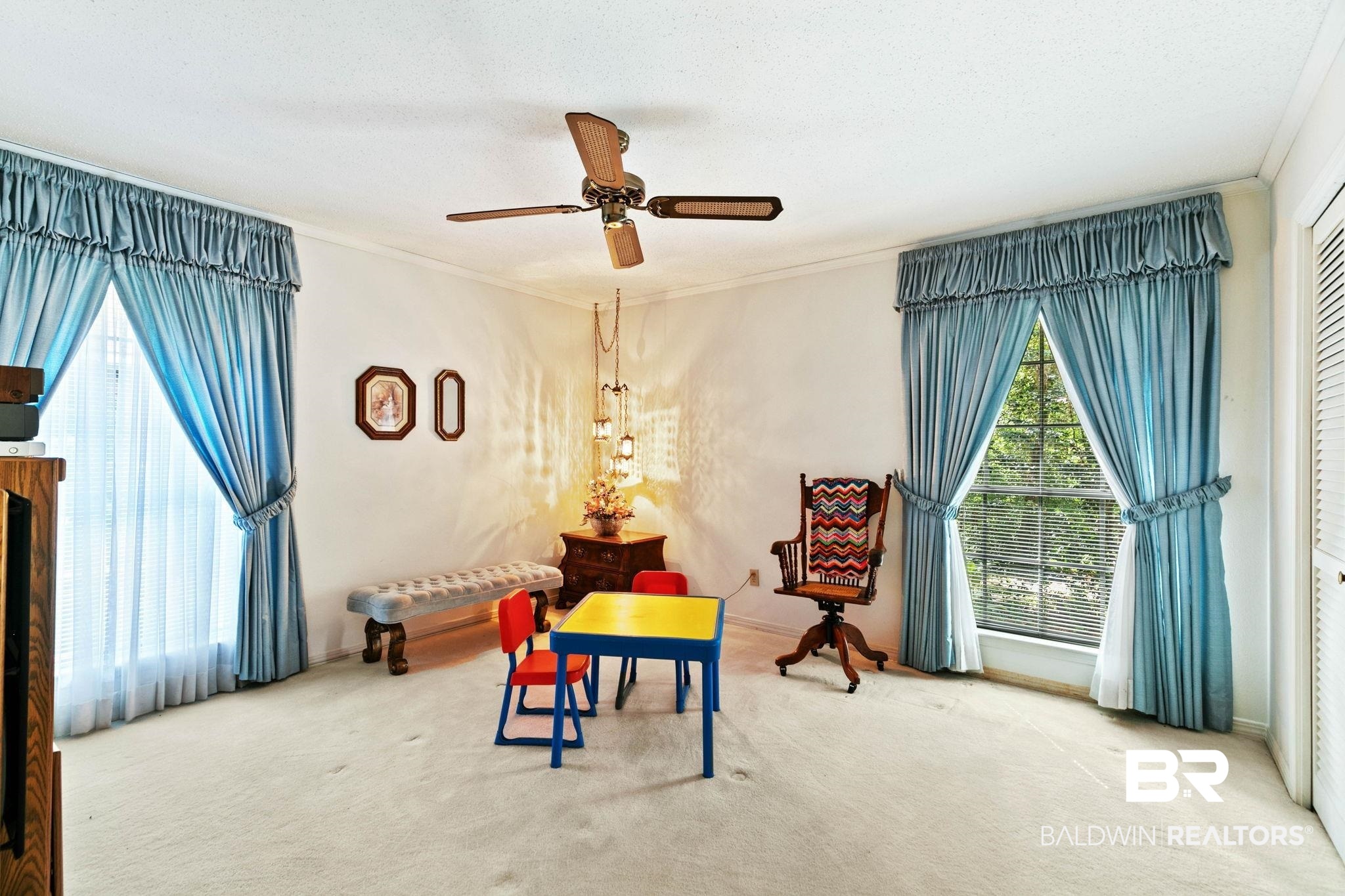 752 Evergreen Street Fairhope, AL 36532 - Photo 31 of 100 Living area featuring carpet floors, a ceiling fan, and ornamental molding