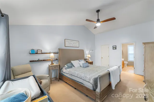 a bathroom with a double vanity sink toilet and shower