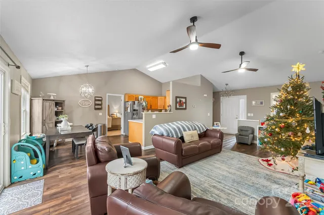 a kitchen that has a lot of cabinets in it and appliances