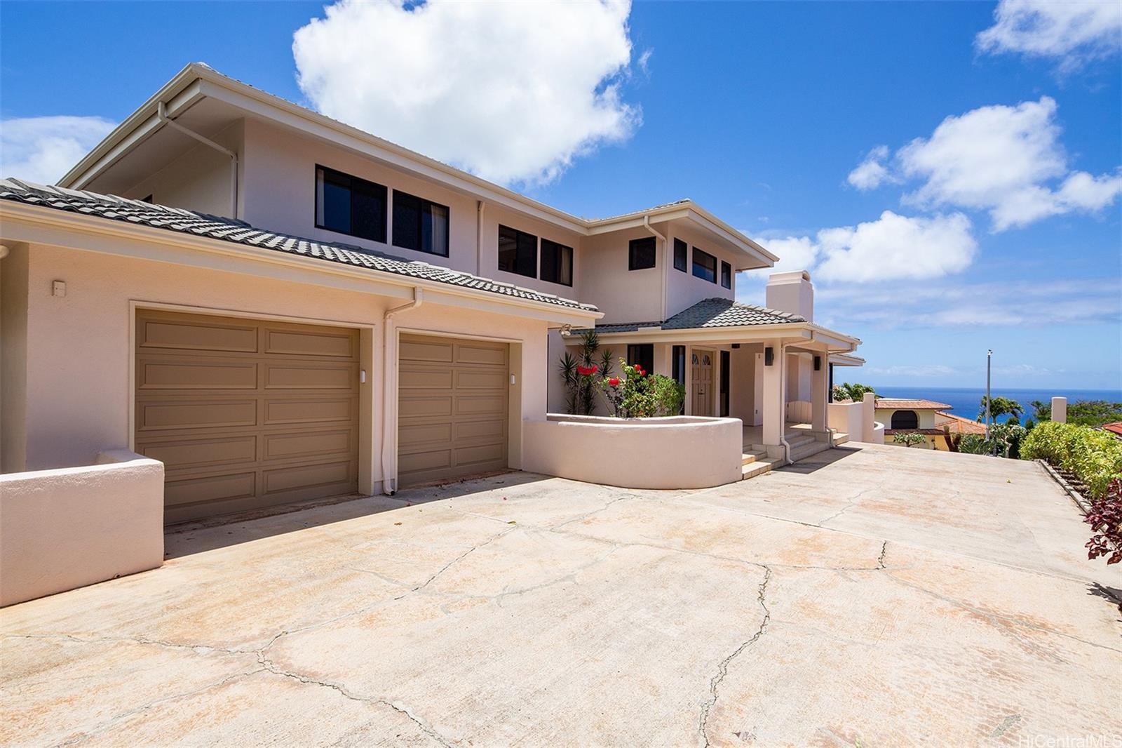 154 Maono Place Honolulu, HI 96821 - Photo 1 of 25 a view of a white house with a outdoor space