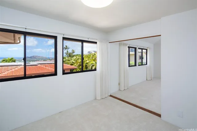 an empty room with windows