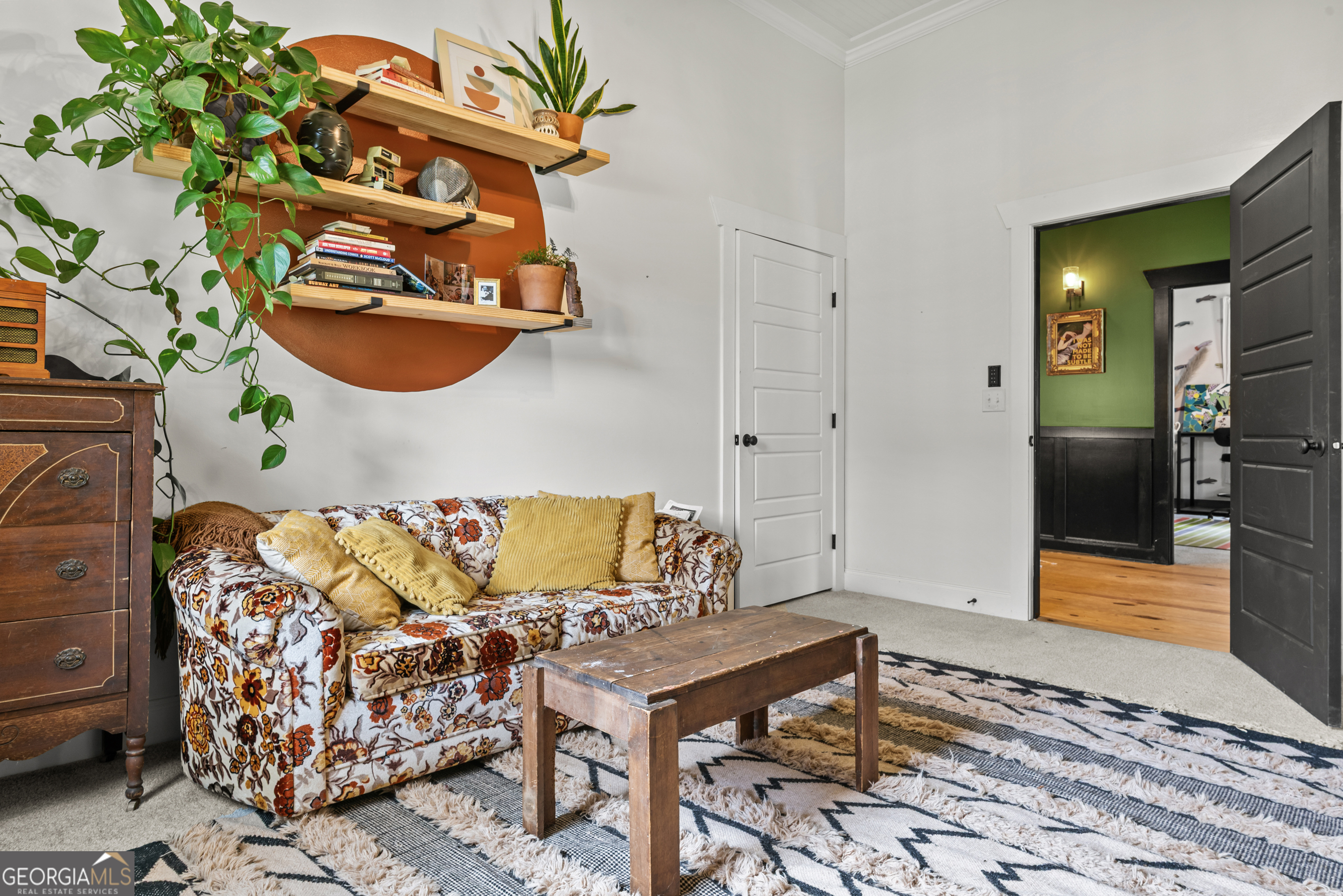 1580 Farmington Road Madison, GA 30650 - Photo 29 of 52 a living room with a couch and a table