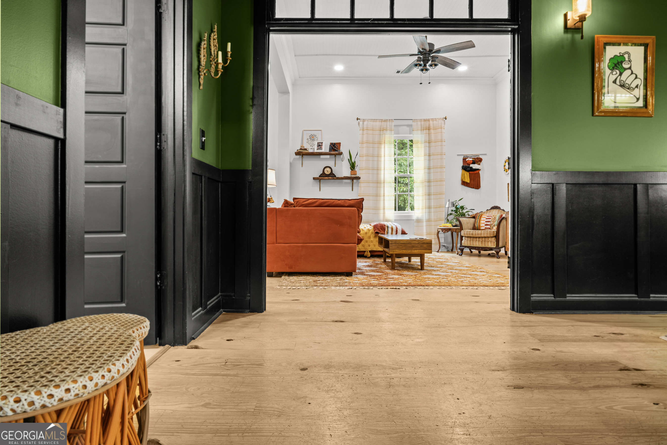 1580 Farmington Road Madison, GA 30650 - Photo 10 of 52 a living room with a bed furniture and a window