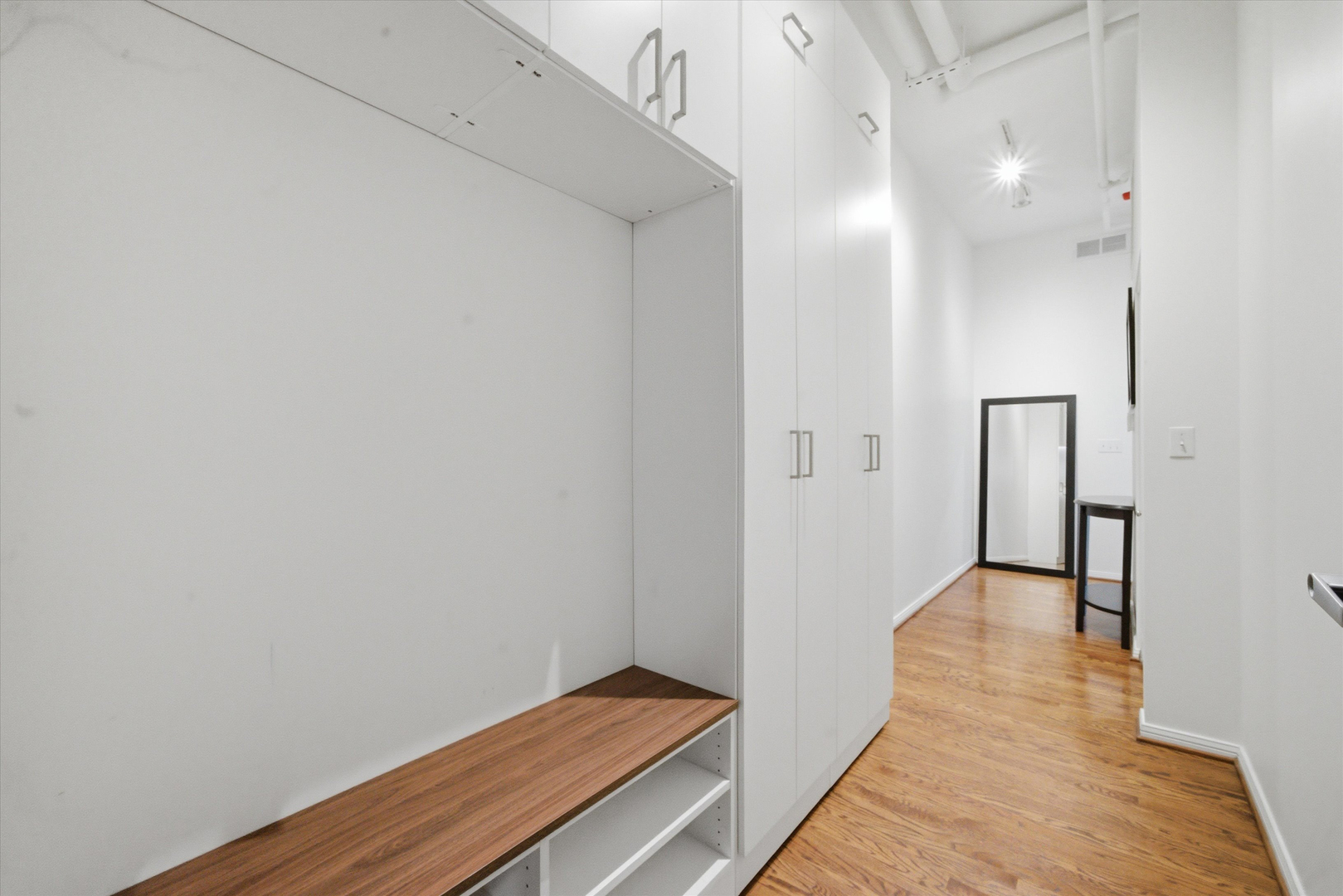 950 West Monroe Street, Unit 401 Chicago, IL 60607 - Photo 21 of 27 a view of hallway with wooden floor