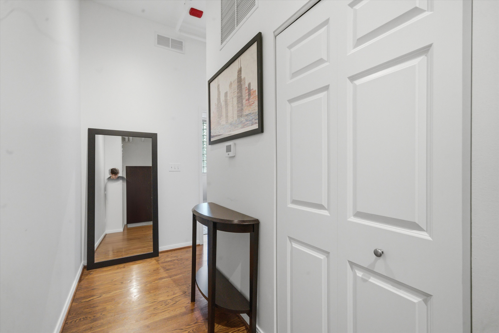 950 West Monroe Street, Unit 401 Chicago, IL 60607 - Photo 22 of 27 a view of hallway with wooden floor and stairs