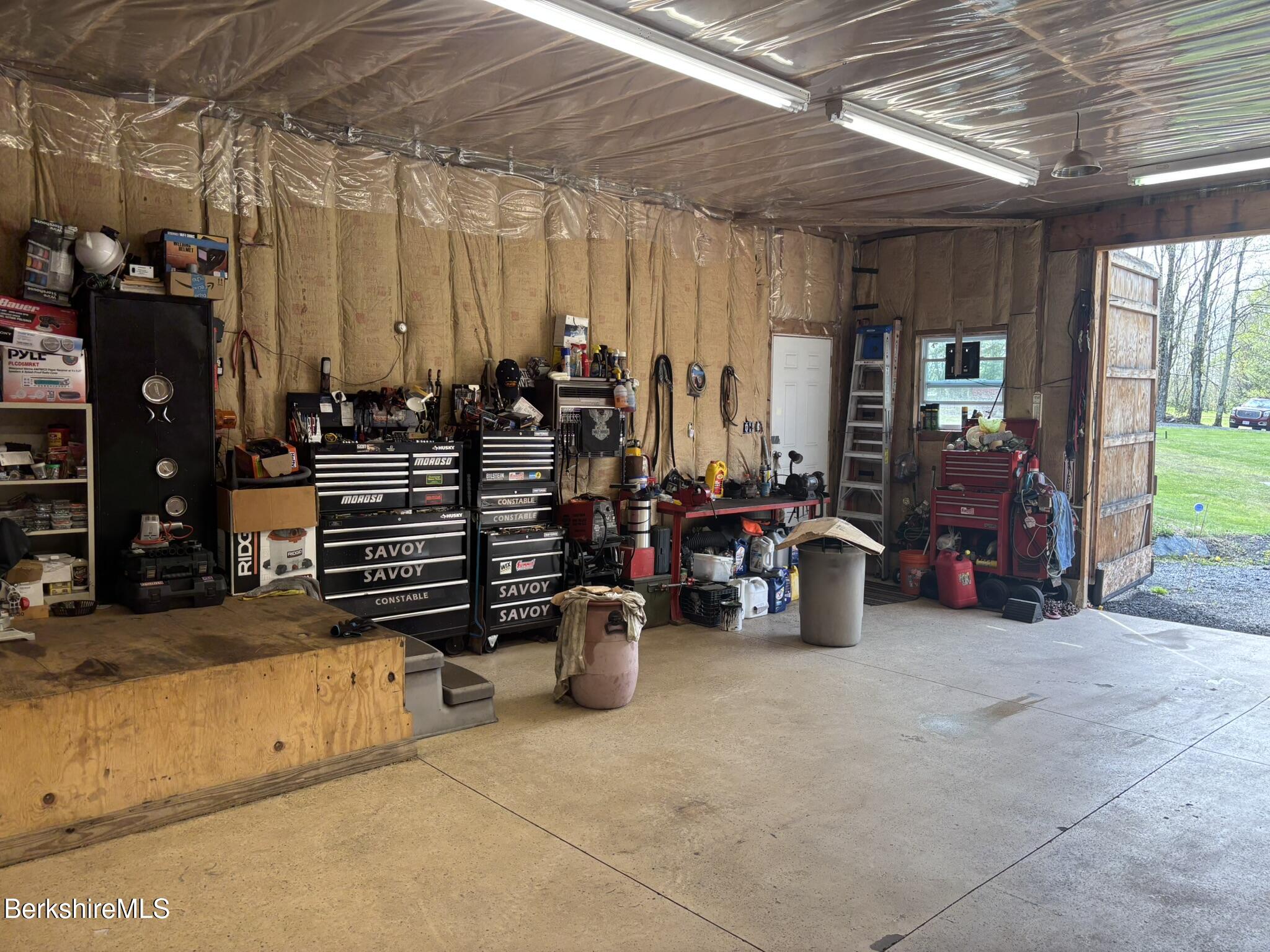 500 Loop Road Savoy, MA 01256 - Photo 12 of 27 a view of a garage with stuff
