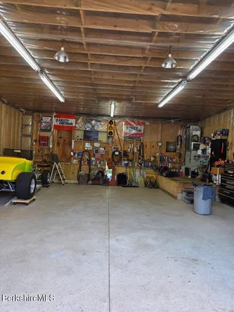 a view of a storage room with a table and chairs