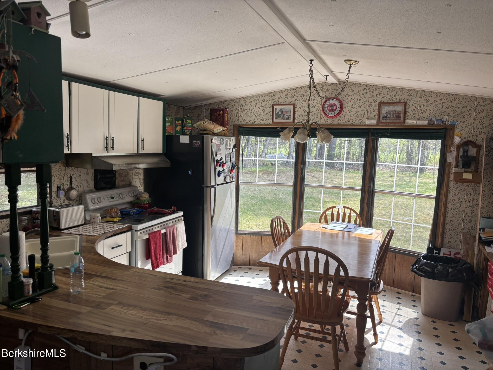 500 Loop Road Savoy, MA 01256 - Photo 2 of 27 a view of a dining room with furniture window and outside view
