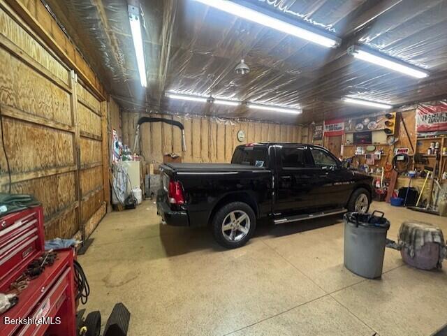 500 Loop Road Savoy, MA 01256 - Photo 27 of 27 a car parked in a garage