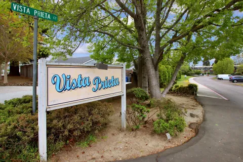 a sign that is on the side of a road