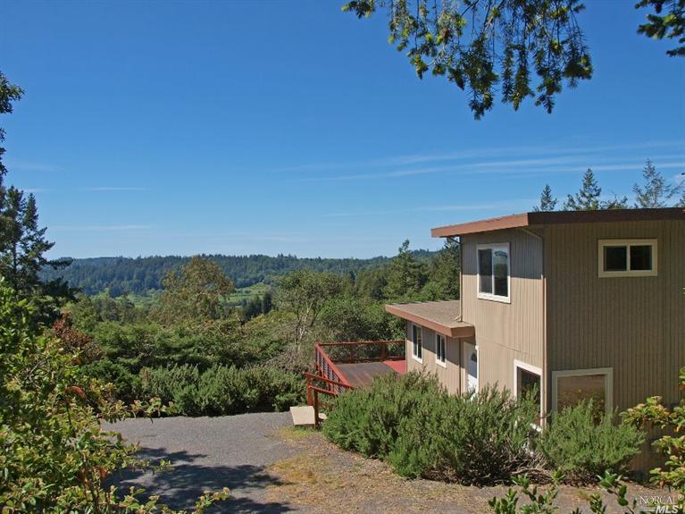 1291 Rim Of The Redwoods Road Sebastopol, CA 95472 - Photo 1 of 1 a view of a terrace with a garden