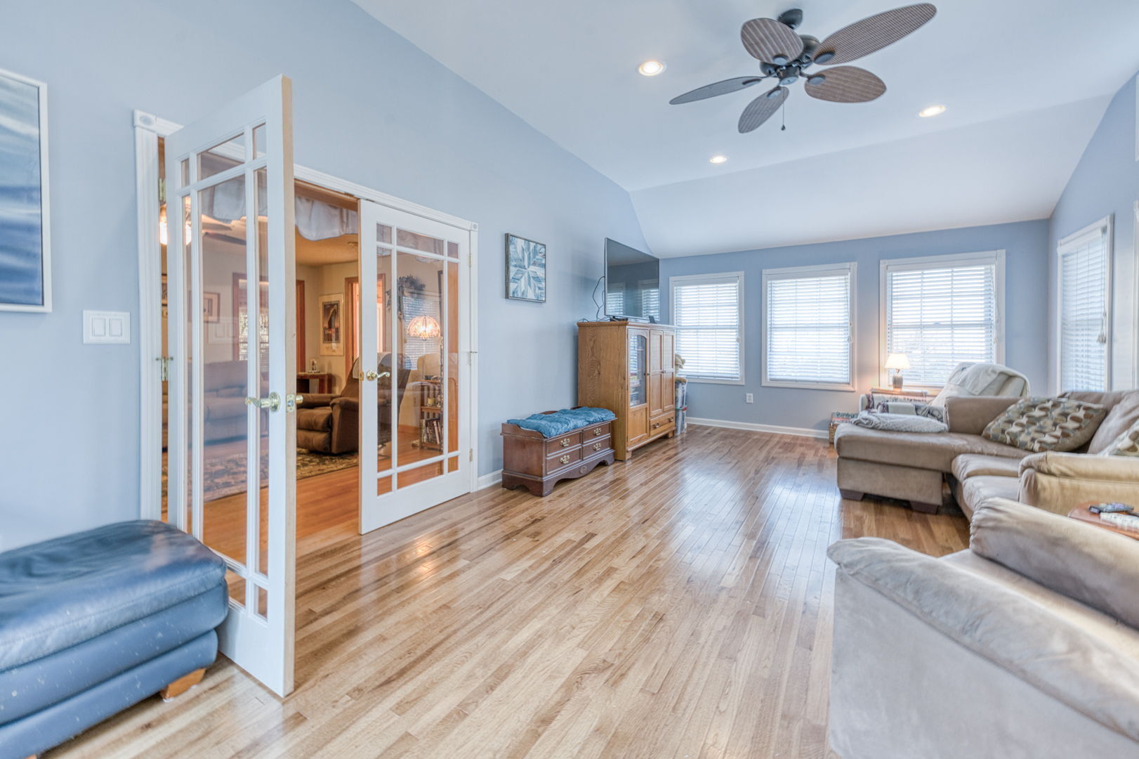 51 Devaux Road Torrington, CT 06790 - Photo 11 of 27 a living room with furniture and a chandelier