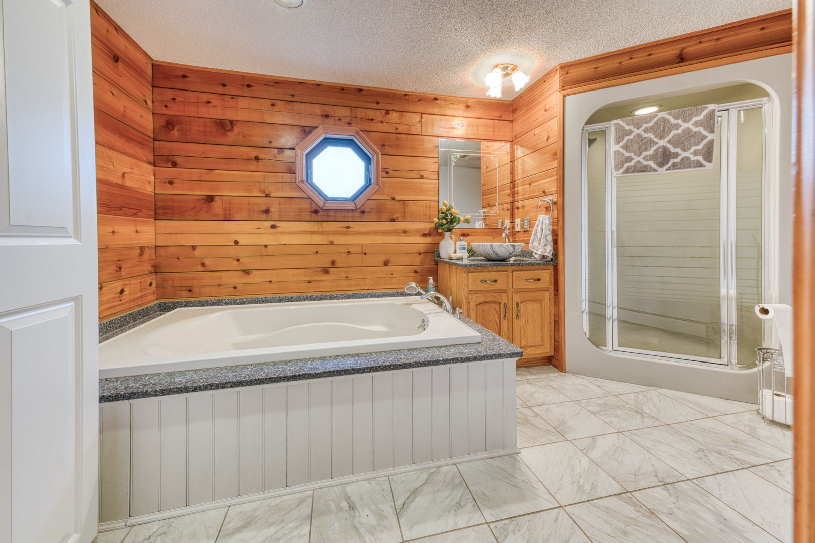 51 Devaux Road Torrington, CT 06790 - Photo 17 of 27 a view of a bathroom with a sink and a mirror