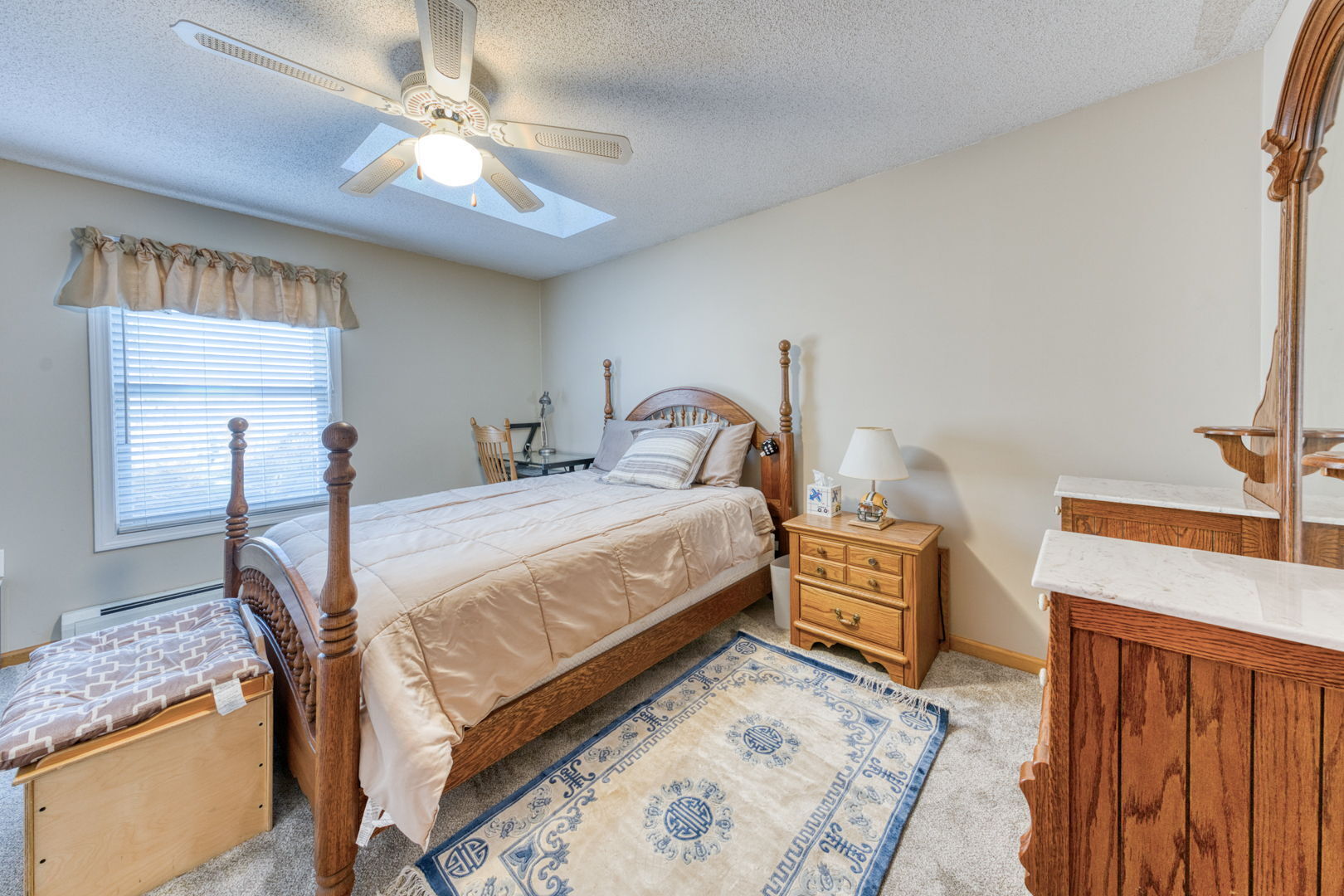 51 Devaux Road Torrington, CT 06790 - Photo 24 of 27 a bedroom with a bed and a dresser