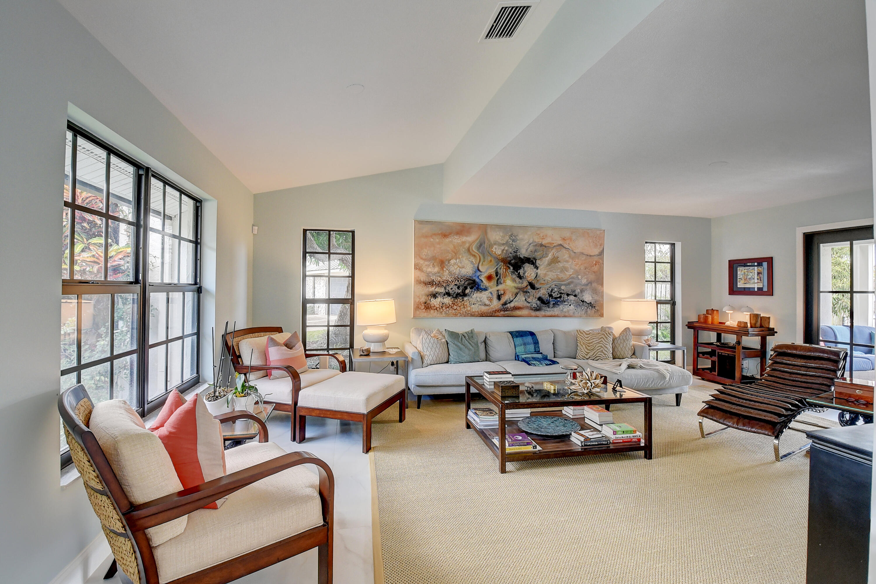 399 Southwest 15th Street Boca Raton, FL 33432 - Photo 13 of 49 a living room with furniture and a large window