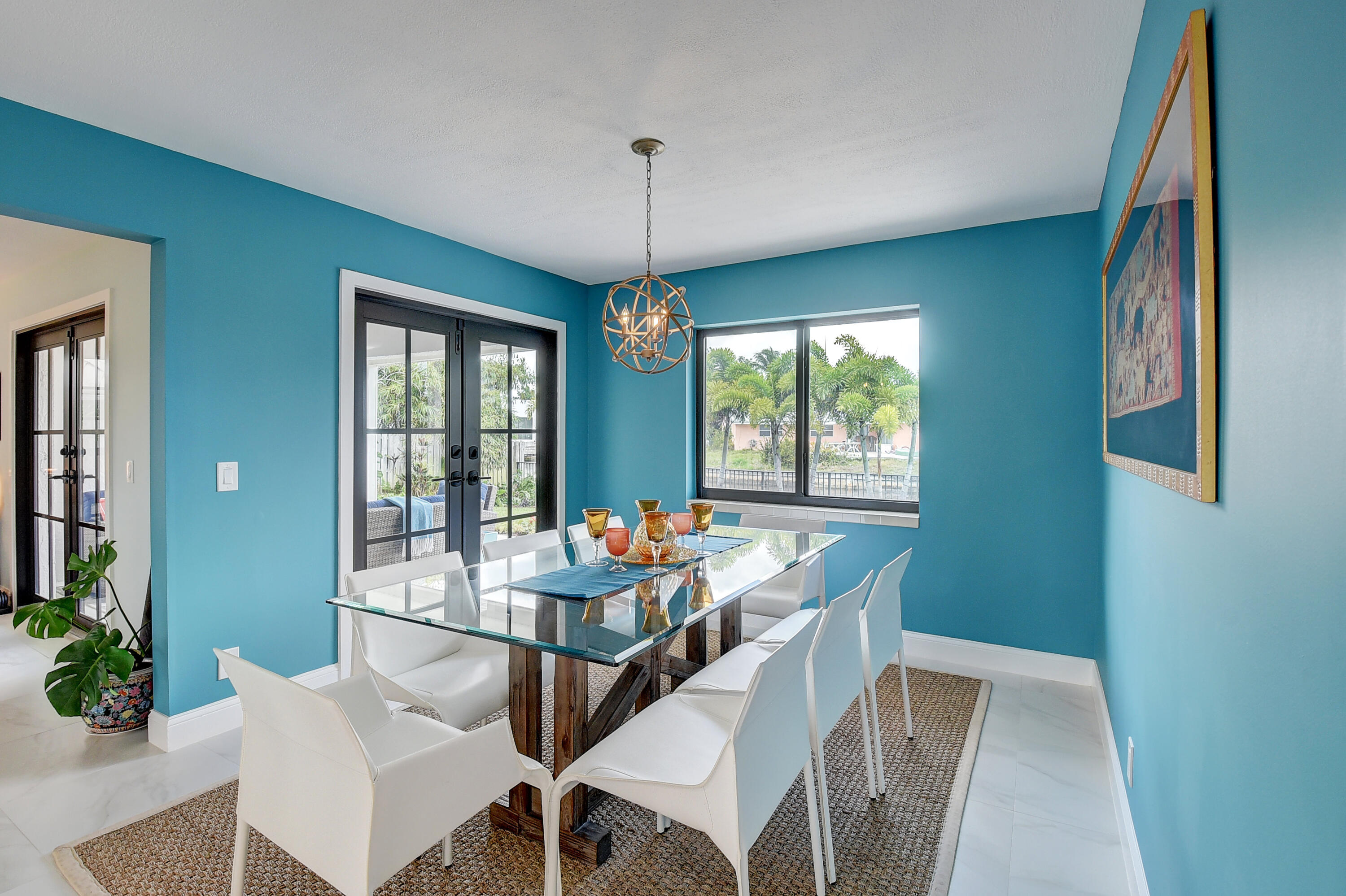 399 Southwest 15th Street Boca Raton, FL 33432 - Photo 18 of 49 a dining room with furniture window and wooden floor