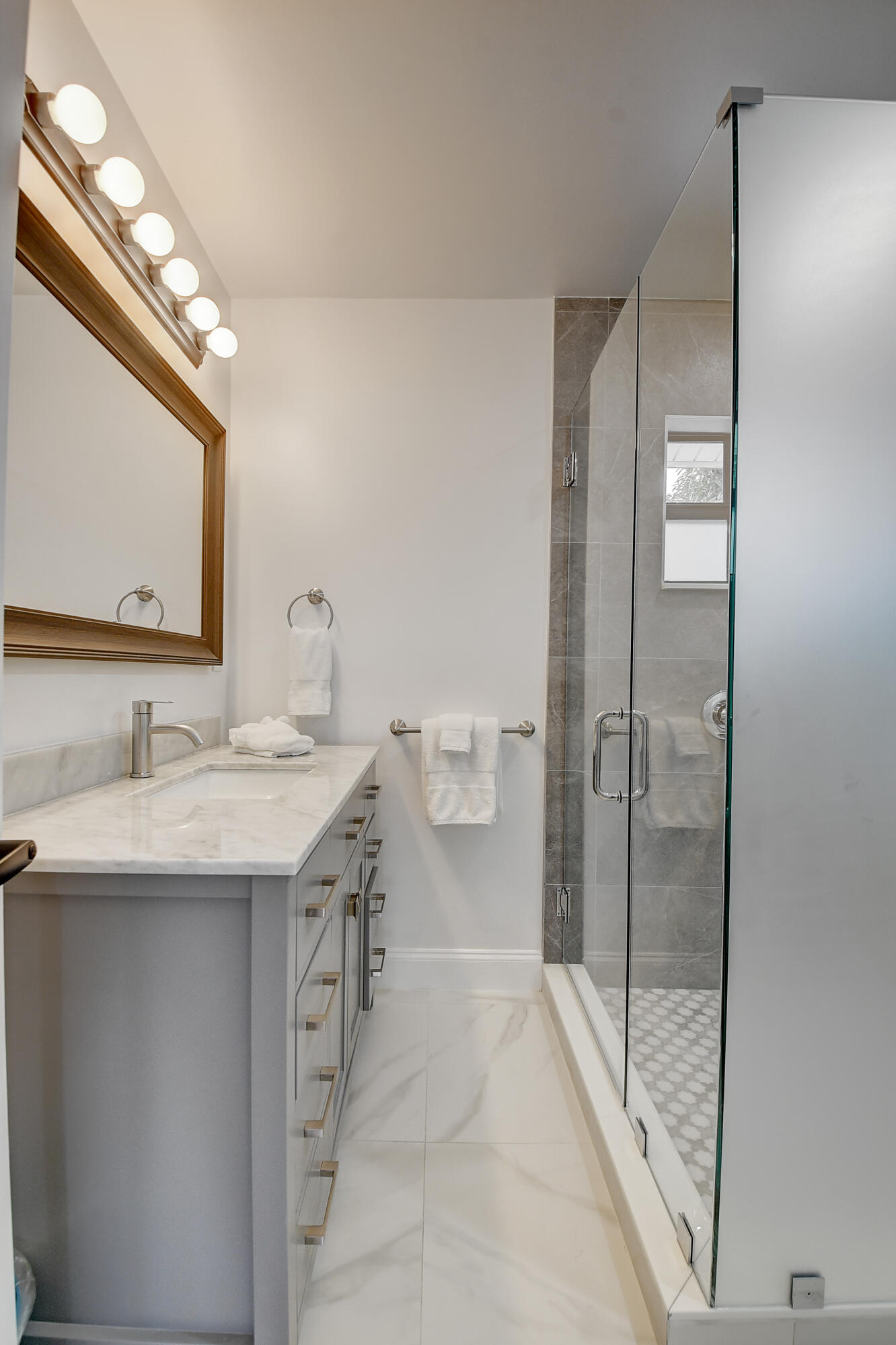 399 Southwest 15th Street Boca Raton, FL 33432 - Photo 30 of 49 a bathroom with a sink a toilet and shower